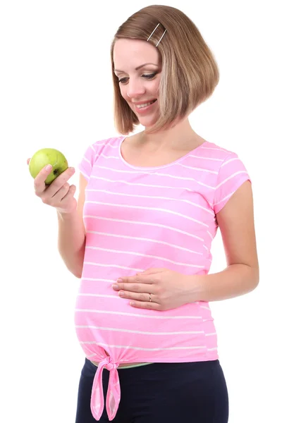 Mujer embarazada joven con manzana verde —  Fotos de Stock