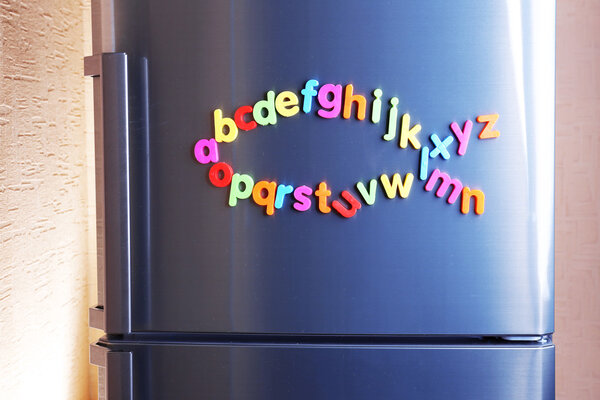Colorful magnetic letters on refrigerator