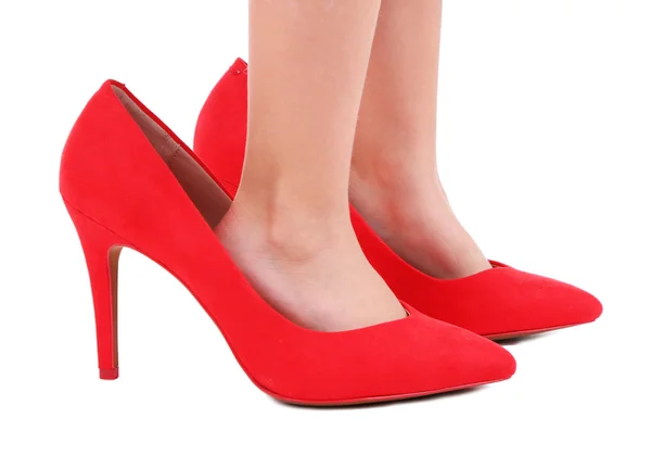 Liten flicka i röda skor isolerad på vit — Stockfoto