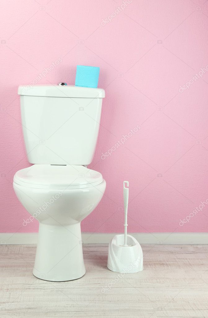 White toilet bowl in bathroom