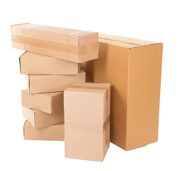 Diferentes cajas de cartón aisladas en blanco — Foto de Stock