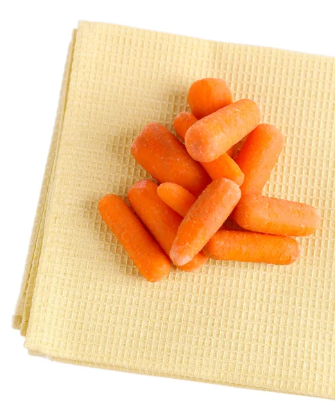 Дитячі морквяні палички на кольоровій серветці, ізольовані на білому — стокове фото