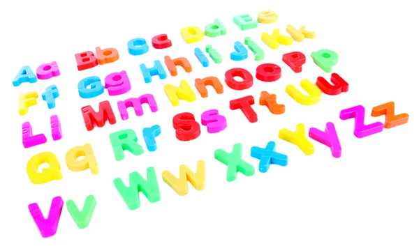 Colorful magnetic letters isolated on white — Stock Photo, Image