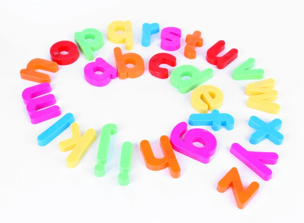 Colorful magnetic letters isolated on white — Stock Photo, Image