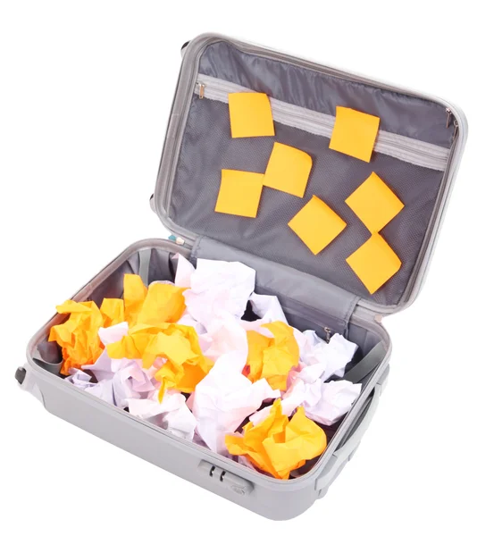 Koffer met papier stickers geïsoleerd op wit openen — Stockfoto