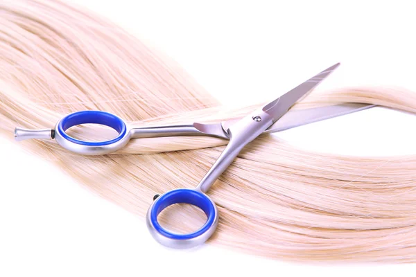 Long blond hair and scissors isolated on white — Stock Photo, Image