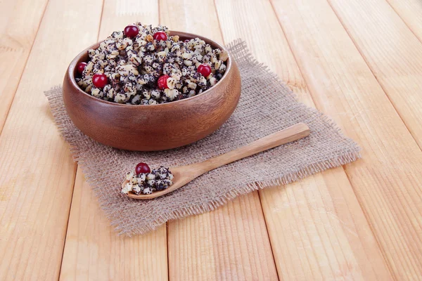 Plate with kutia - traditional Christmas sweet meal in Ukraine, Belarus and Poland, on wooden background — Stock Photo, Image