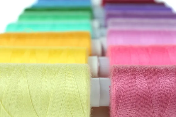 Colored spools of threads close up — Stock Photo, Image