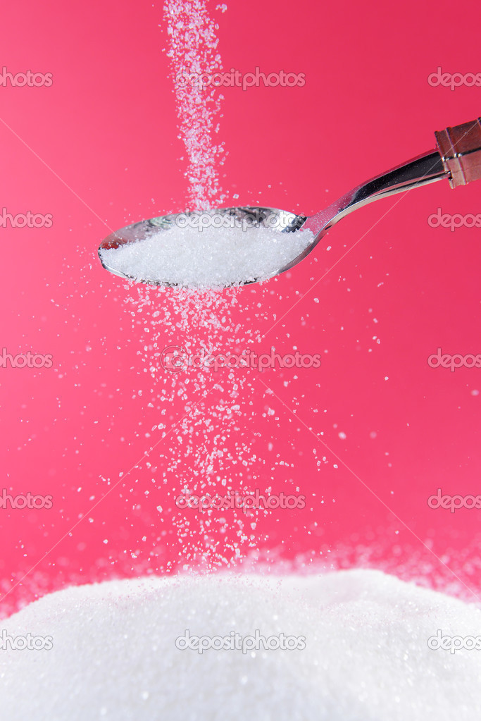 Sugar on red background