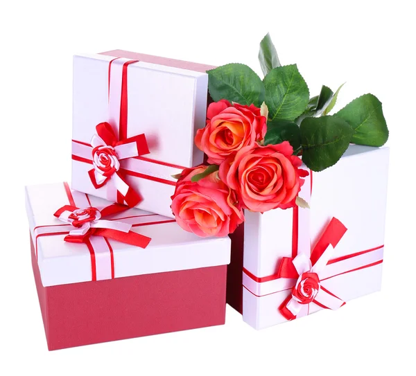 Beautiful gift boxes with flowers isolated on white — Stock Photo, Image