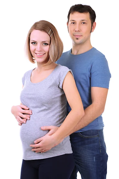Młoda kobieta w ciąży z mężem na białym tle — Zdjęcie stockowe
