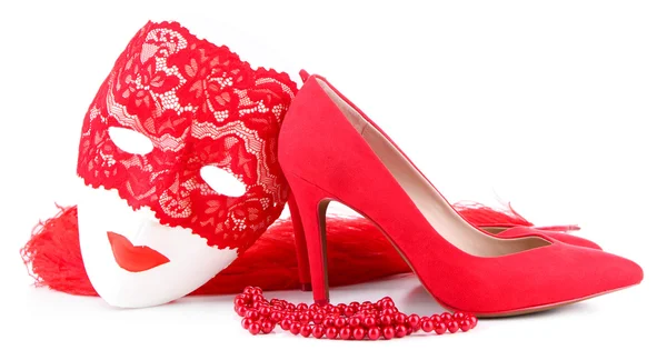 Beautiful red female shoes and carnival mask, isolated on white — Stock Photo, Image