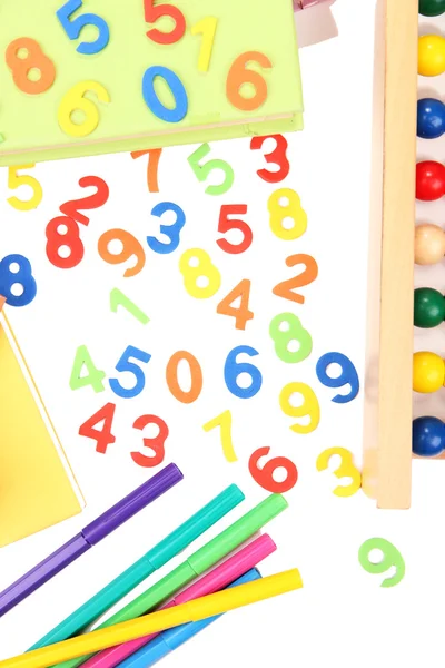 Colorful numbers, abacus, books and markers, isolated on white — Stock Photo, Image