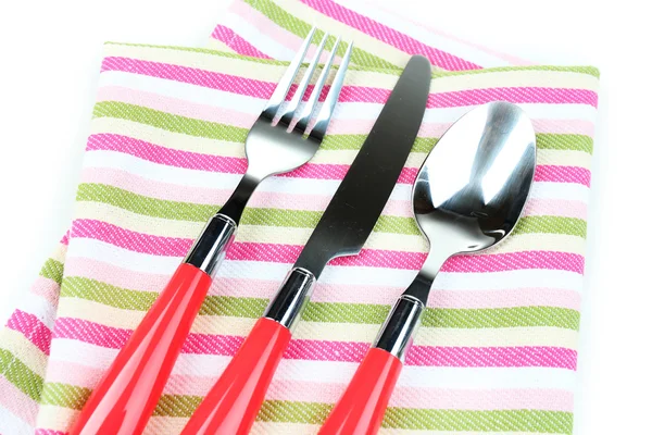 Kitchen cutlery on color napkin close up — Stock Photo, Image