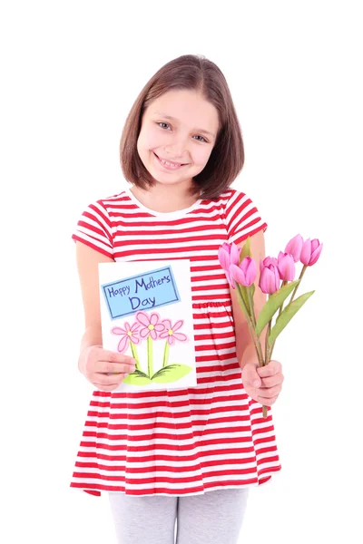 Beautiful little girl with flowers and postcard in her hand, isolated on white — Stock Photo, Image