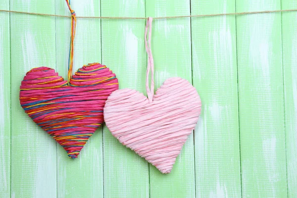 Decorative hearts on wooden background — Stock Photo, Image