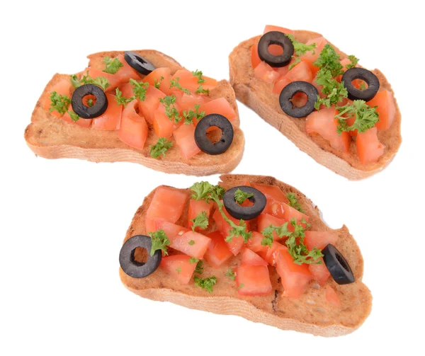 Läcker bruschetta med tomater isolerad på vit — Stockfoto