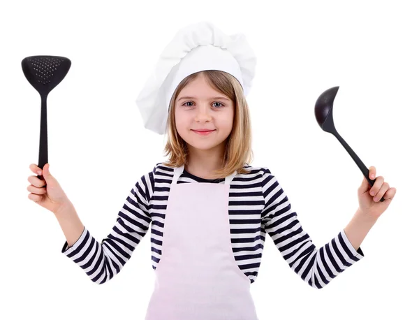 白で隔離される台所スプーンを保持している美しい小さな女の子 — ストック写真