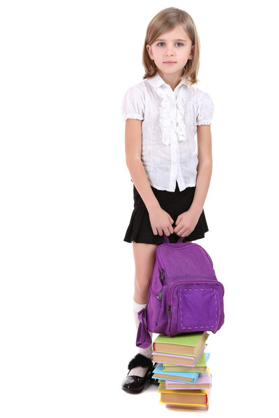 Beautiful little girl holding backpack isolated on white