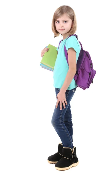 Krásná holčička s batohem drží knihy izolovaných na bílém — Stock fotografie