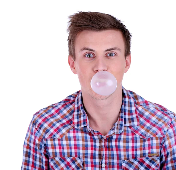 Young man blowing bubble of chewing gum isolated on white — Stock Photo, Image