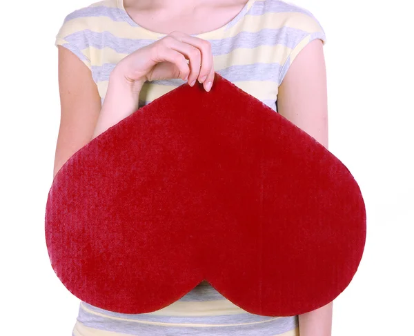 Vrouwelijke houden grote rode hart geïsoleerd op wit — Stockfoto