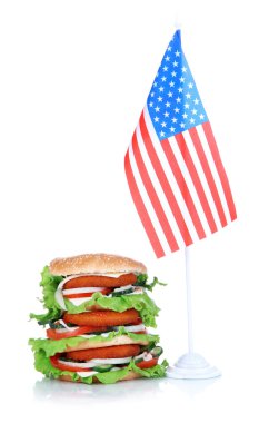 büyük hamburger ve bayrak, üzerinde beyaz izole kompozisyonu