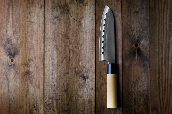 Cuchillo de cocina sobre fondo de madera — Foto de Stock