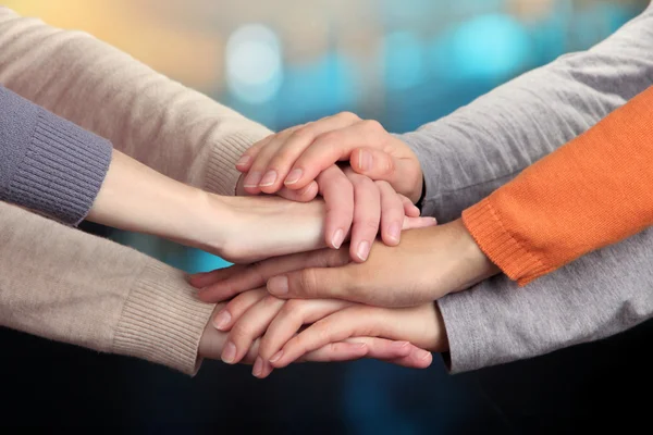 Human hands on bright background — Stock Photo, Image