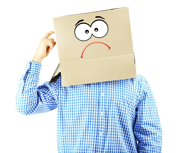 Man with cardboard box on his head isolated on white — Stock Photo, Image