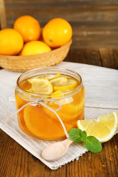 Tasty lemon jam on table close-up — Stock Photo, Image