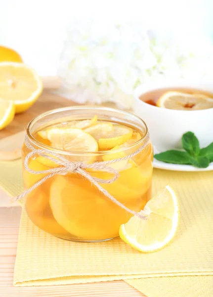 Tasty lemon jam on table close-up — Stock Photo, Image