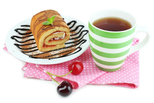 Cup of tea and sweets isolated on white — Stock Photo, Image