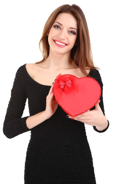 Donna attraente con scatola regalo in forma di cuore, isolato su bianco — Foto Stock