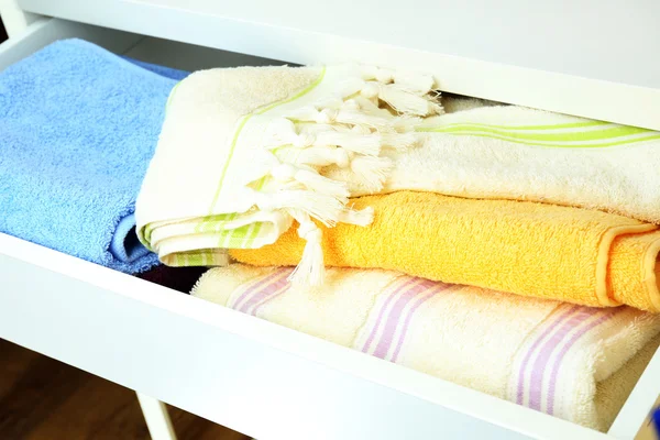 Towels in open drawer close up — Stock Photo, Image