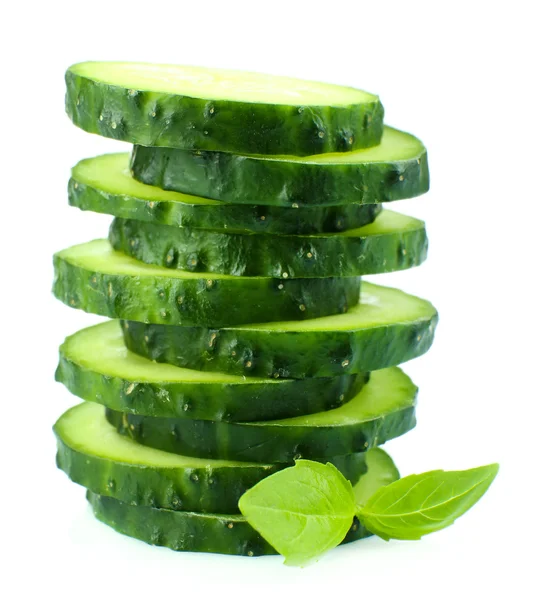 Sliced fresh cucumber with basil, isolated on white — Stock Photo, Image