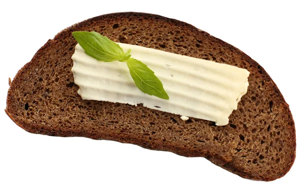 Segment van roggebrood met boter, geïsoleerd op wit — Stockfoto