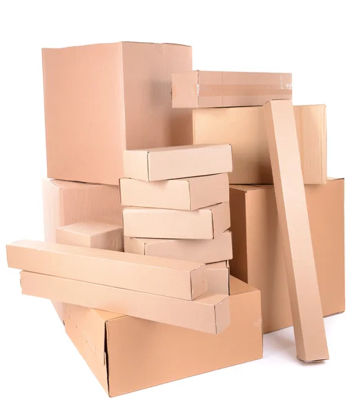 Différentes boîtes en carton isolées sur blanc — Photo