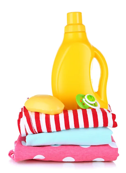 Softener dryer and soap on children clothes isolated on white — Stock Photo, Image