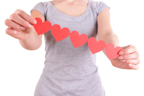 Hands holding paper hearts isolated on white — Stock Photo, Image