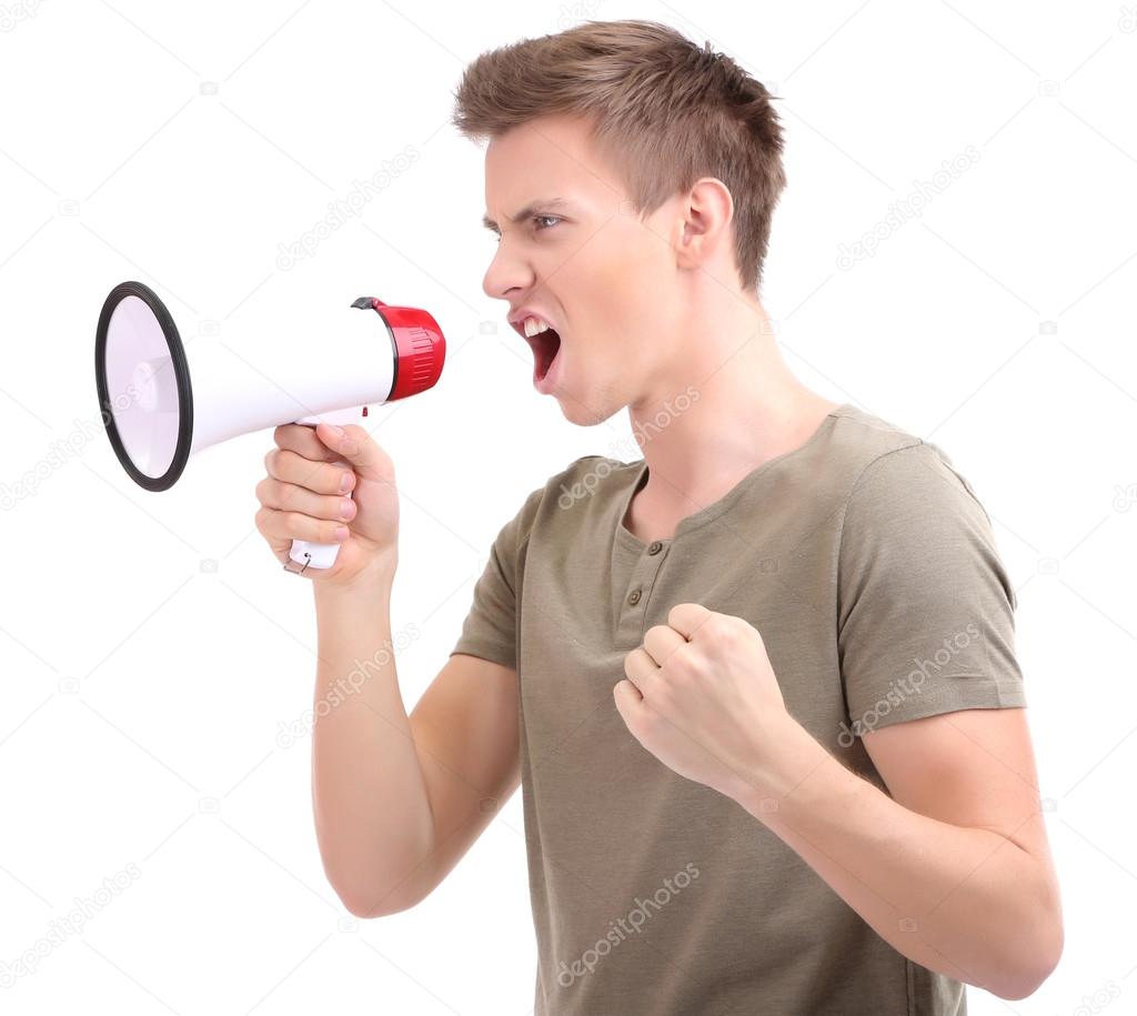 Portrait of young man handsome shouting using megaphone , isolated on white