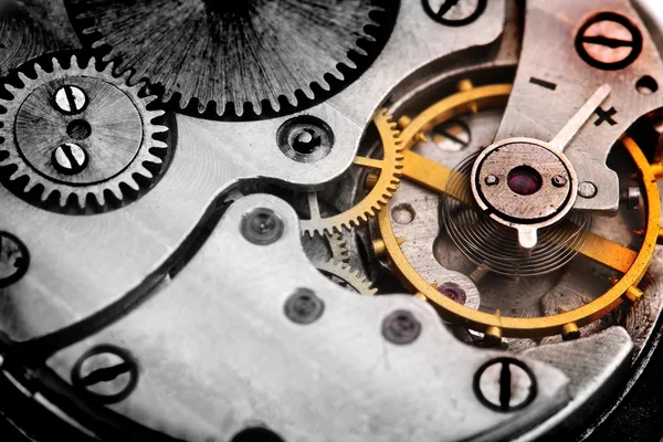 Clockwork details, pions and wheels close seup — стоковое фото