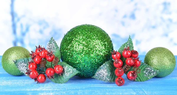 Composition of Christmas decorations on table on light background — Stock Photo, Image