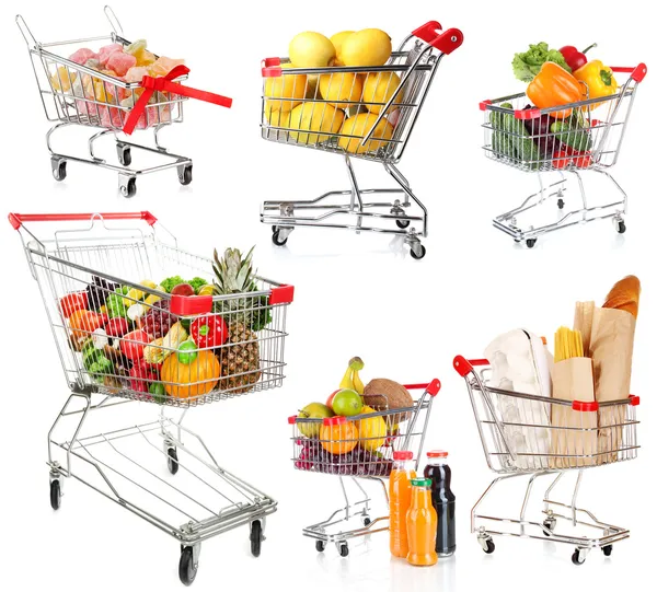 Trolleys with different products isolated on white — Stock Photo, Image
