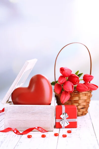 Romantic still life with heart in wooden casket — Stock Photo, Image