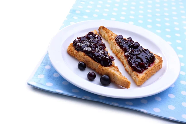 Delicious toast with jam on plate isolated on white — Stock Photo, Image