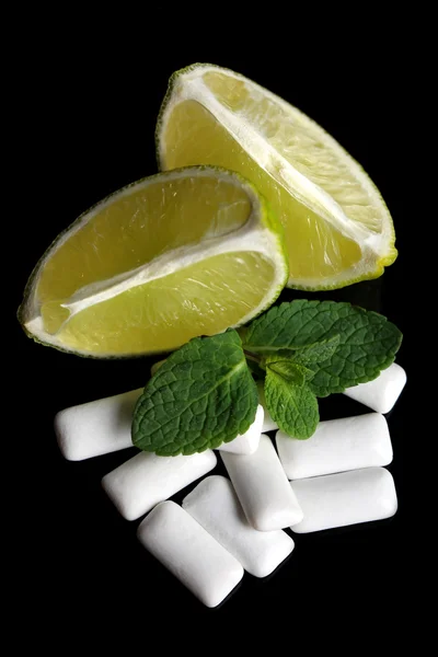 Chewing gum with fruit taste, isolated on black — Stock Photo, Image