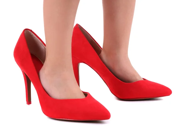 Menina em sapatos vermelhos isolado no branco — Fotografia de Stock