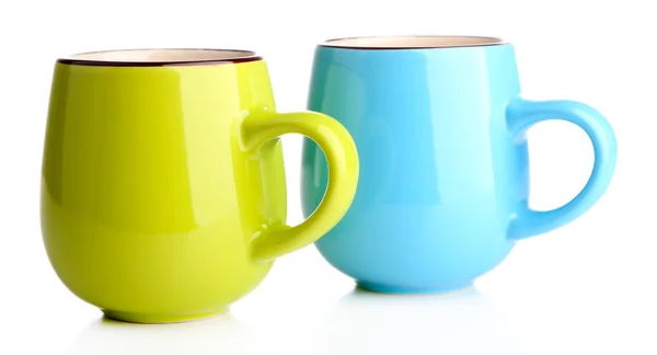 Tasses colorées isolées sur blanc — Photo