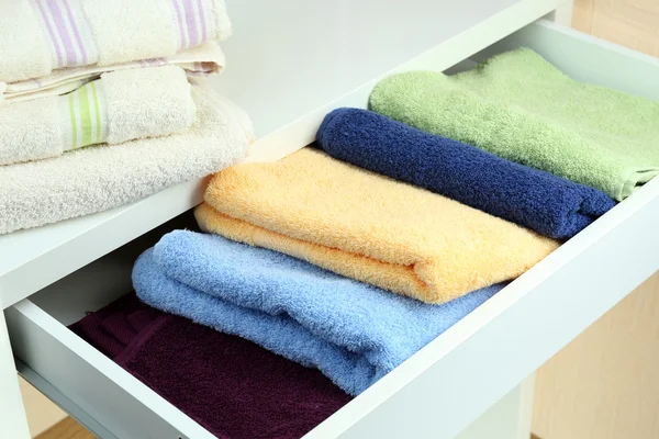 Towels in open drawer close up — Stock Photo, Image